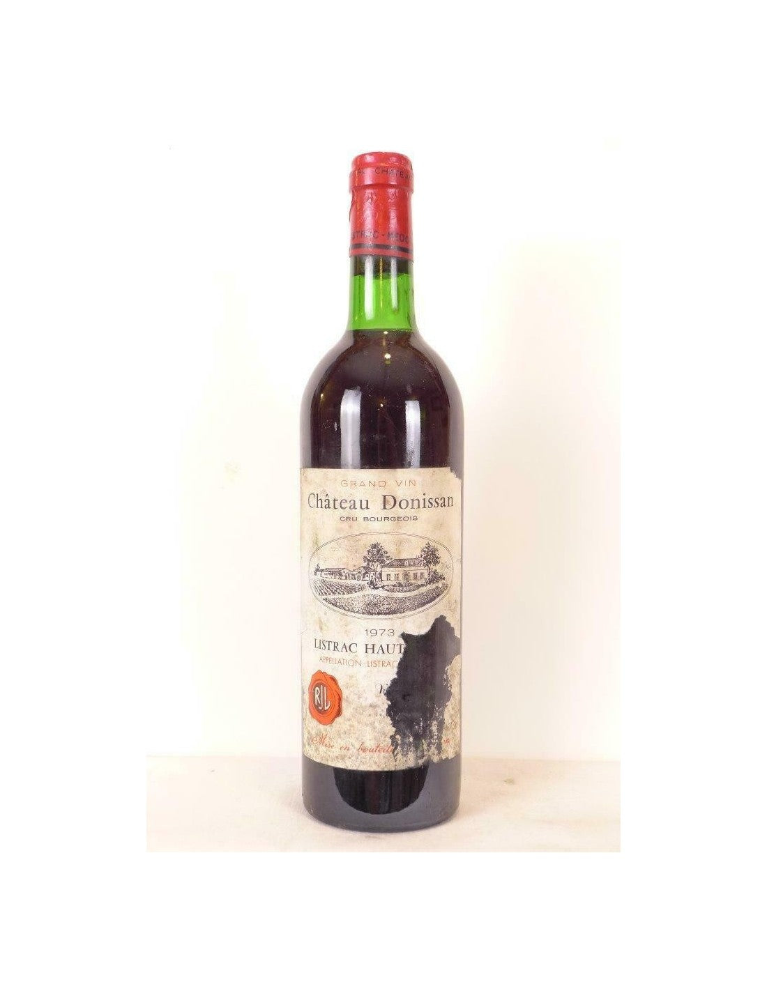 1973 - listrac - château donissan cru bourgeois (étiquette très abîmée) - rouge - bordeaux - Just Wines 