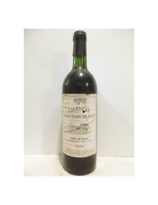 1974 - côtes de bourg - château haut-guiraud (étiquette abîmée) - rouge - bordeaux - Just Wines 